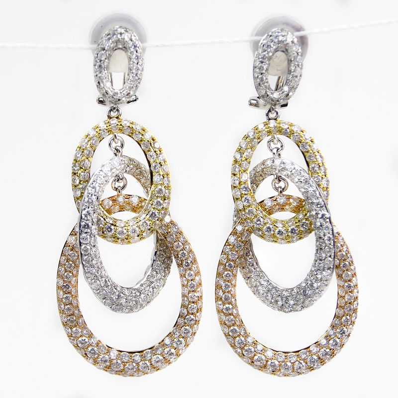 Cartier style Approx. 9.0 Carat Pave Set Round Brilliant Cut Diamond and Tricolor Gold Chandelier Earrings.