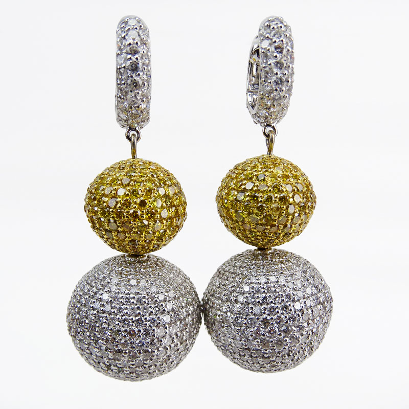 Contemporary Approx. 21.60 Carat Pave Set Round Brilliant Cut Fancy Intense Yellow and White Diamond and 18 Karat White Gold Pendant Earrings.
