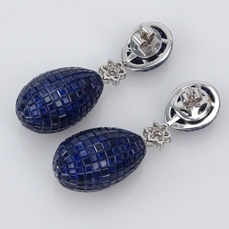 Contemporary Approx. 84.09 Carat Invisible Set Sapphire, .86 Carat Diamond and 18 Karat White Gold Pendant Earrings with Detachable Pendant. 