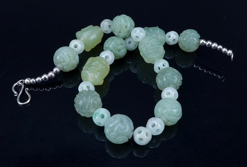 Collection of Two (2) 19/20th Century Chinese Jade Jewelry Items.