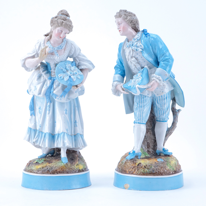 Pair of German Porcelain  Male and Female Figurines.