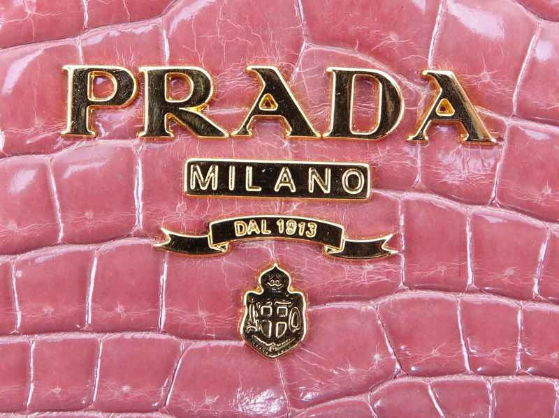 Prada Limited Edition Pink Crocodile Clutch.