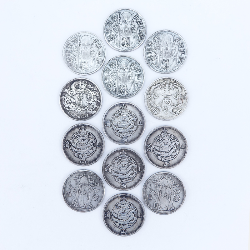 Collection of Thirteen (13) Antique Chinese Silver-Metal Coins.