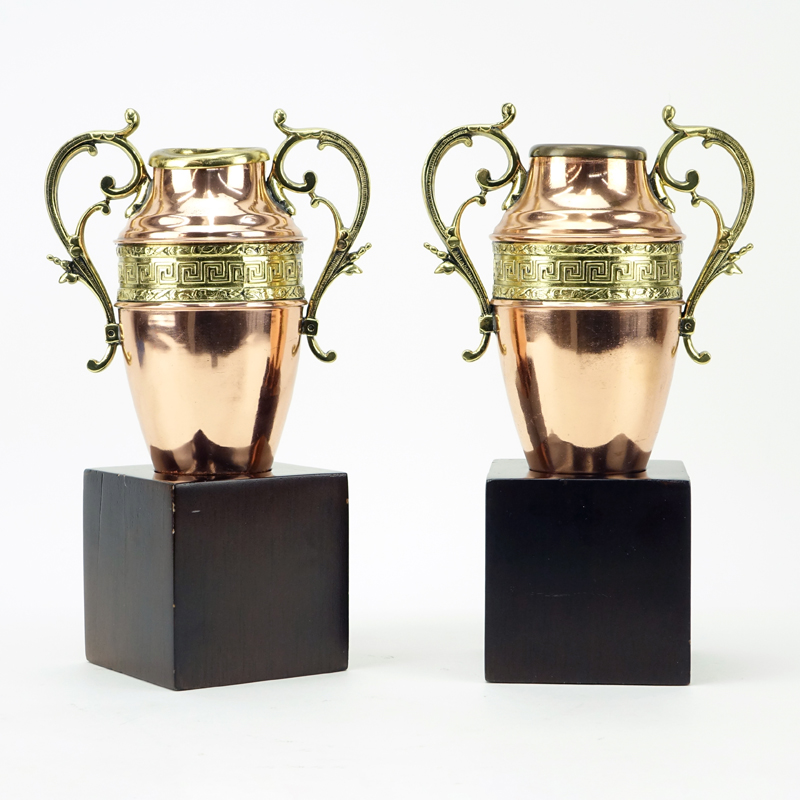 Pair of Continental Style Copper and Brass Urns on Wooden Stands.