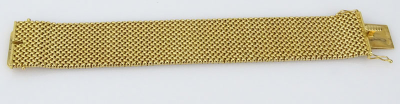 Vintage Heavy 18 Karat Yellow Gold Flexible Link Bracelet. Signed J.J. 18K.