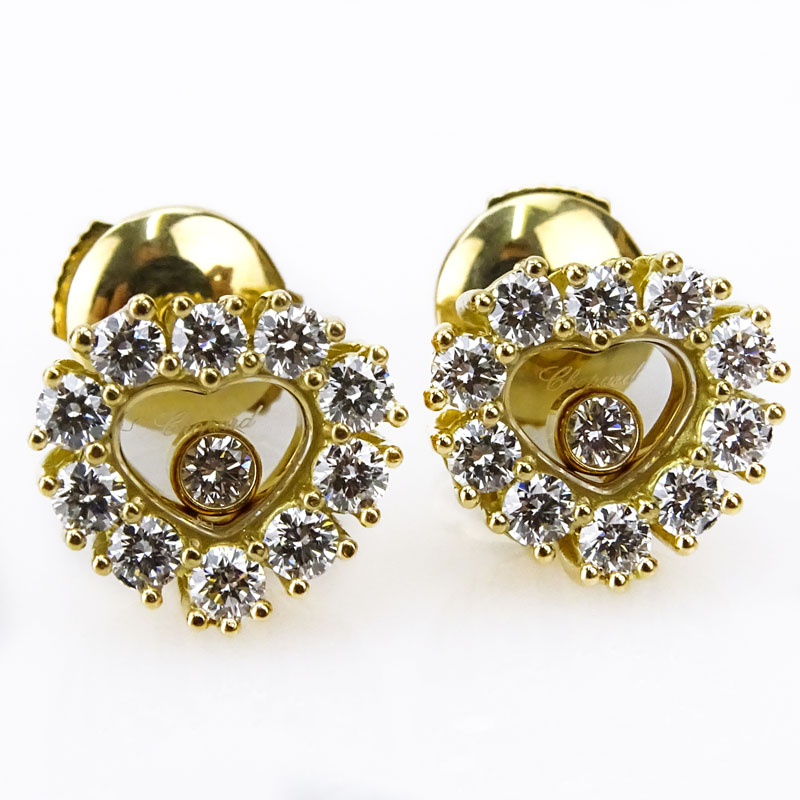 Chopard Happy Diamond 1.10 Carat Round Brilliant Cut Diamond and 18 Karat Yellow Gold Earrings.