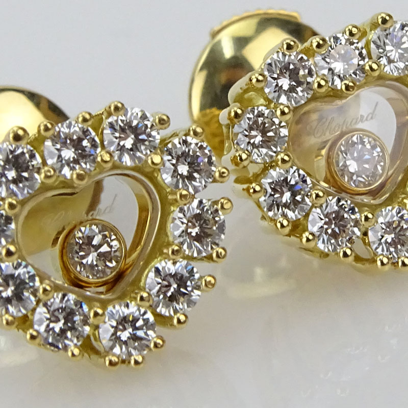 Chopard Happy Diamond 1.10 Carat Round Brilliant Cut Diamond and 18 Karat Yellow Gold Earrings.
