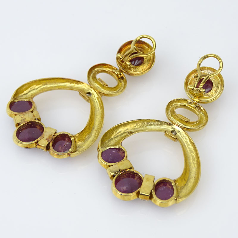 Cabochon Burma Ruby, Diamond and 18 Karat Yellow Gold Pendant Earrings.