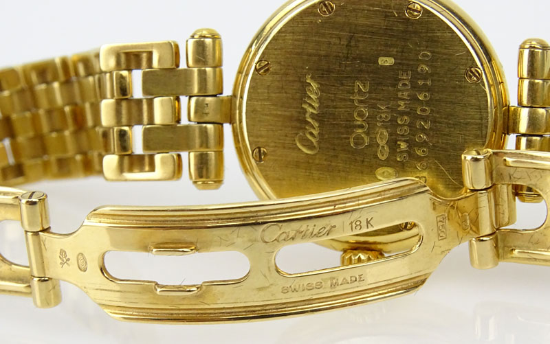 Lady's Cartier Vendome 18 Karat Yellow Gold Panther Link Bracelet Watch with Swiss Quartz Movement.