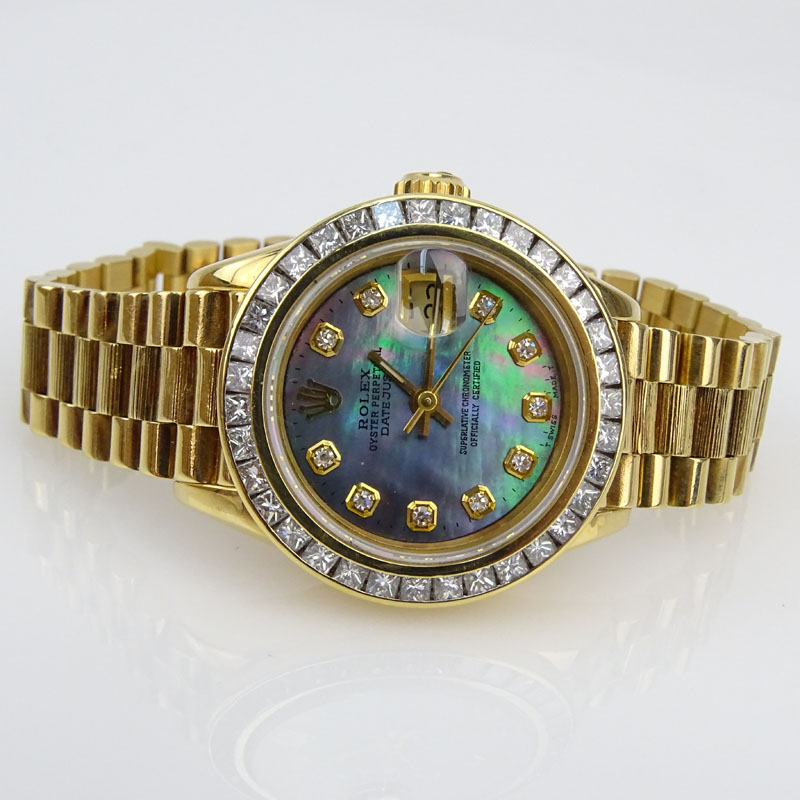 Lady's Rolex 18 Karat Yellow Gold Date Just Bracelet Watch.