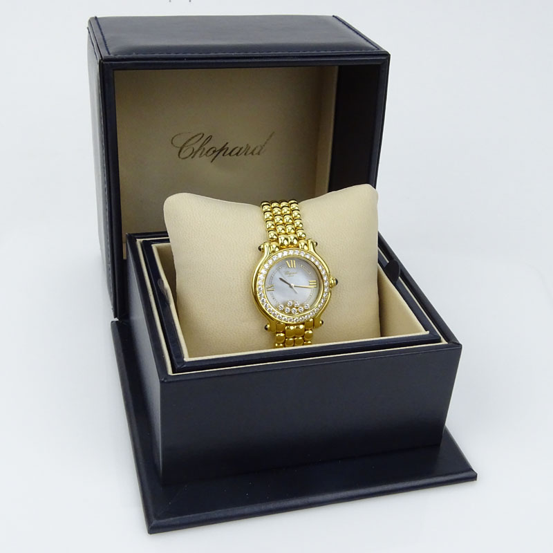 Lady's Chopard 18 Karat Yellow Gold Happy Sport Bracelet Watch.