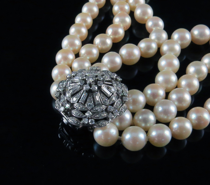 Lady's Vintage Three Strand Pearl Necklace with Diamond and Karat 18 Karat White Gold Clasp.
