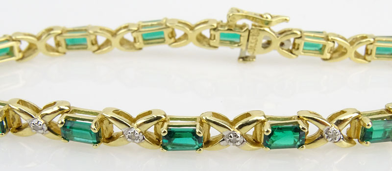 Vintage Emerald and Diamond 14 Karat Yellow Gold Inline Bracelet.