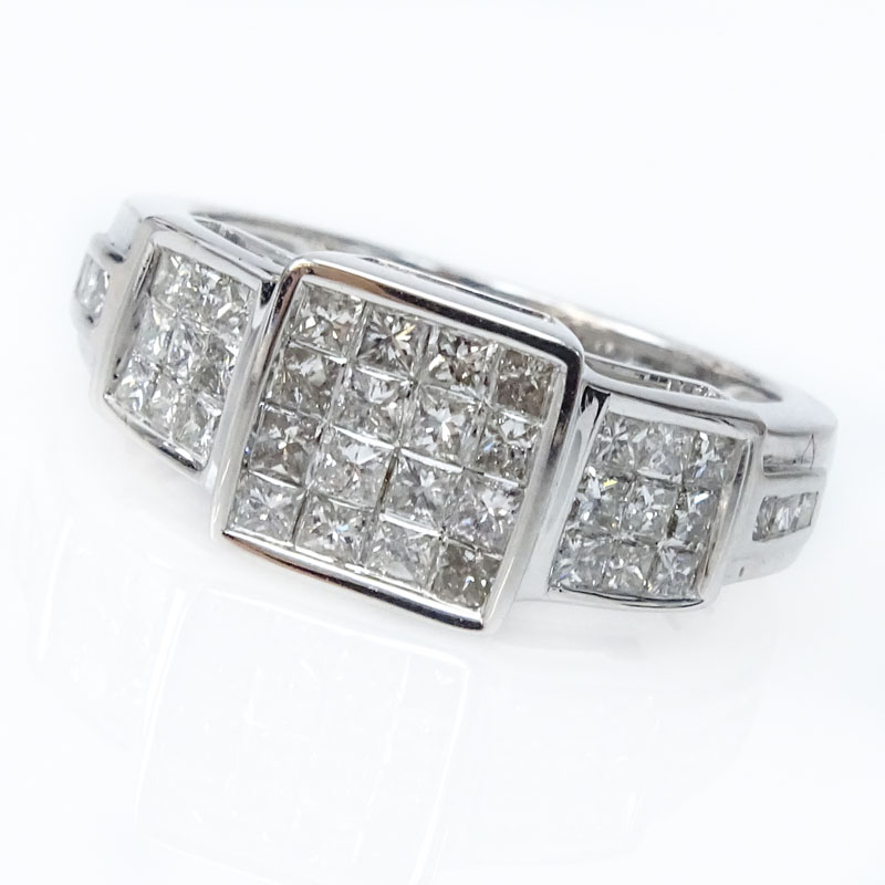 Vintage Invisible Cet Princess Cut Diamond and 14 Karat White Gold Ring.