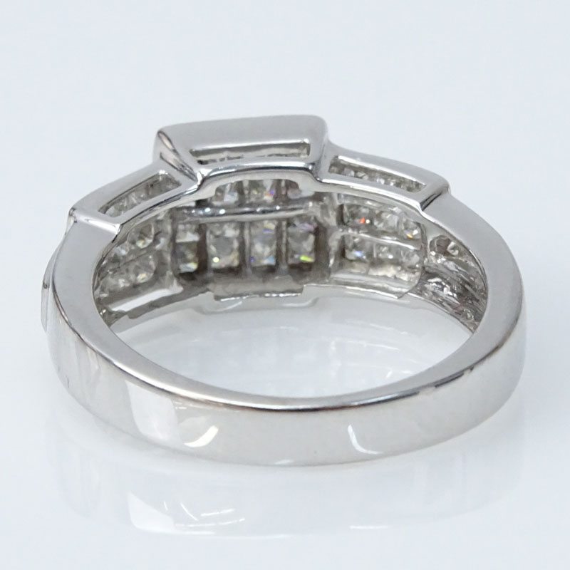 Vintage Invisible Cet Princess Cut Diamond and 14 Karat White Gold Ring.