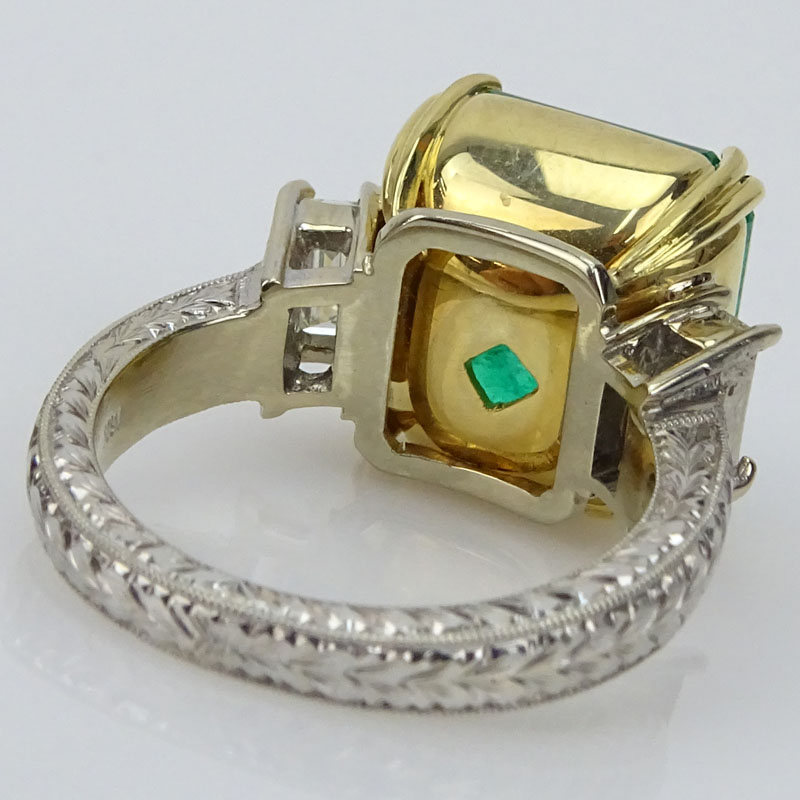 Fine Quality Approx. 12.02 Carat Colombian Emerald, 1.10 Carat Baguette Cut Diamond and 18 Karat Gold Ring. 