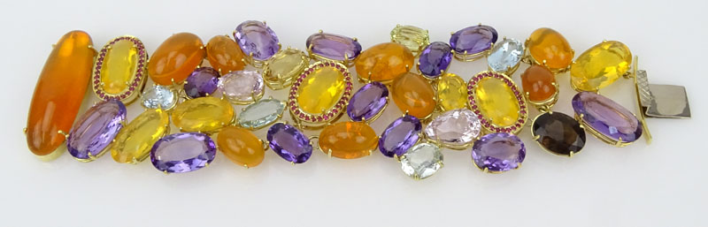 Estate Approx. 285.0 Carat Opal, Aquamarine, Kunzite, Ruby, Amethyst, Citrine and 18 Karat Yellow Gold Wide Bracelet. 