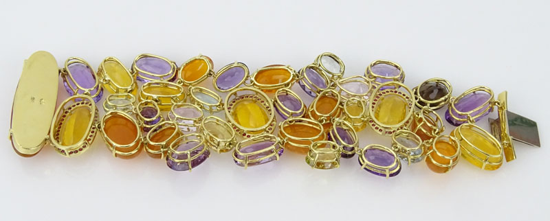 Estate Approx. 285.0 Carat Opal, Aquamarine, Kunzite, Ruby, Amethyst, Citrine and 18 Karat Yellow Gold Wide Bracelet. 