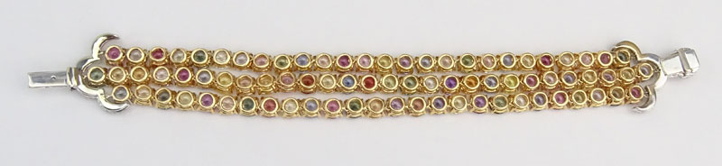 Approx. 100.0 Carat Round Brilliant Cut Multi Color Sapphire, 1.0 Carat Pave Set Diamond and 18 Karat Yellow and White Gold Three Strand Bracelet, Sapphires with vivid saturation of color.