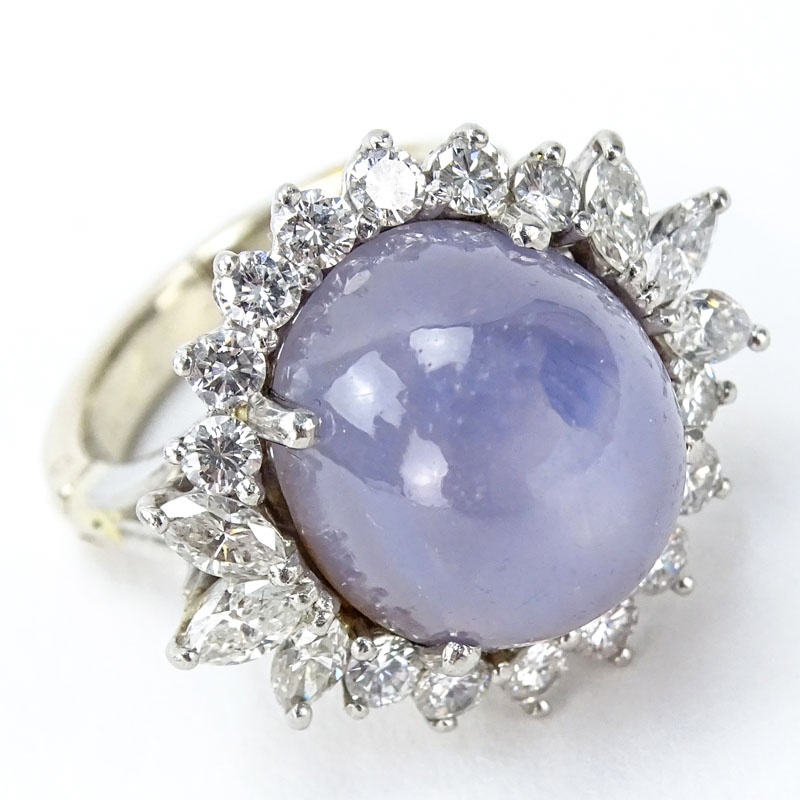 Vintage Approx. 20.0 Carat Cabochon Star Sapphire, 2.0 Carat Round Brilliant Cut Diamond, Platinum and 14 Karat Gold Ring. 
