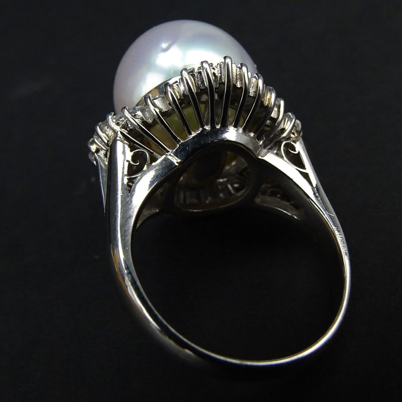 Vintage 14mm South Sea Pearl, 1.37 Carat Tapered Baguette and Round Brilliant Cut Diamond and Platinum Ring. 
