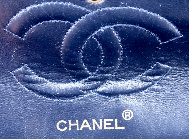 Chanel Navy Quilted Lambskin Leather Classic Double Flap Bag.