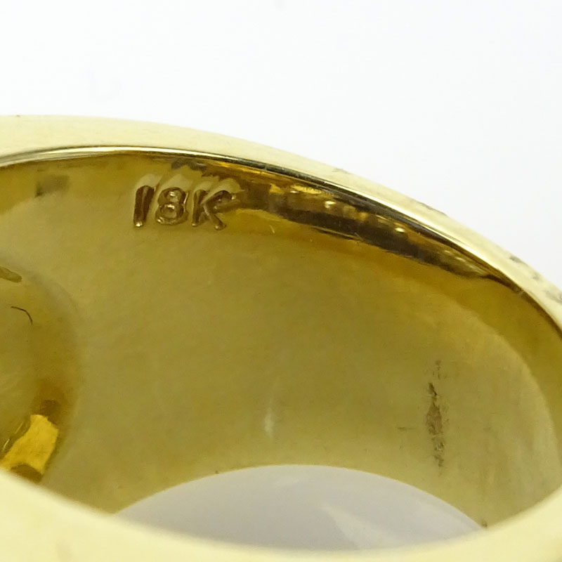 Approx. 13.50 Carat Oval Cut Tanzanite, 2.60 Carat Diamond and 18 Karat Yellow Gold Ring. 