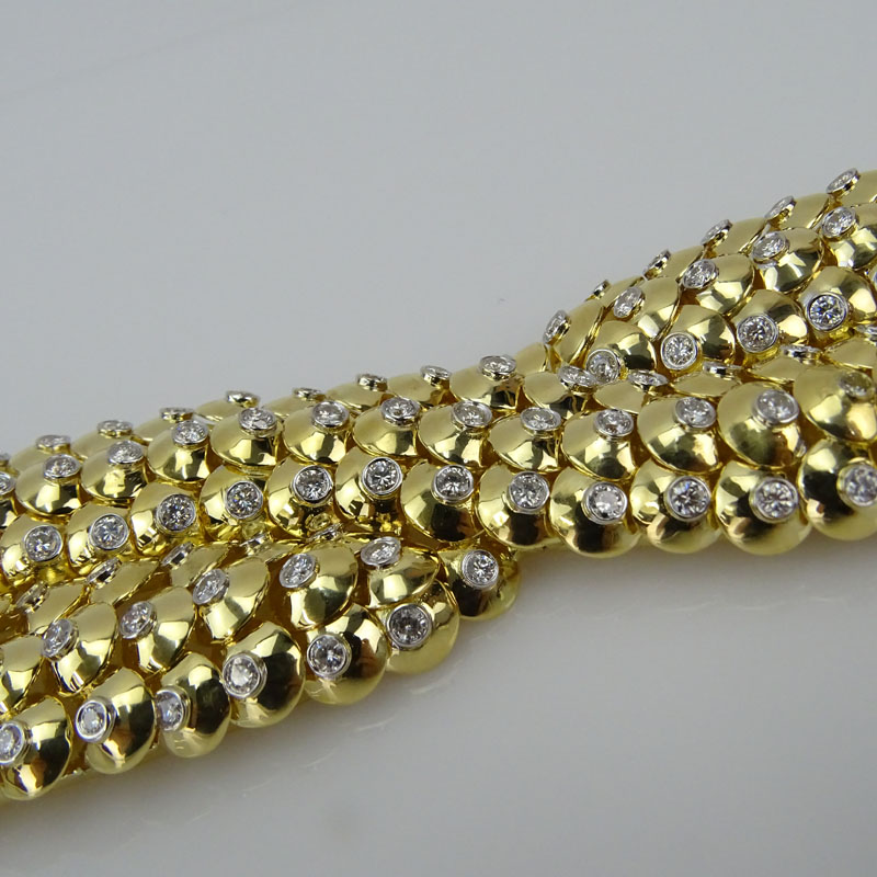 Contemporary Approx. 9.50 Carat Round Brilliant Cut Diamond and 18 Karat Yellow Gold Wide Crossover Bracelet.