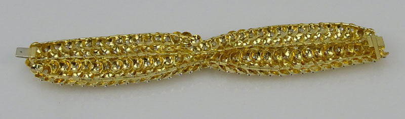 Contemporary Approx. 9.50 Carat Round Brilliant Cut Diamond and 18 Karat Yellow Gold Wide Crossover Bracelet.