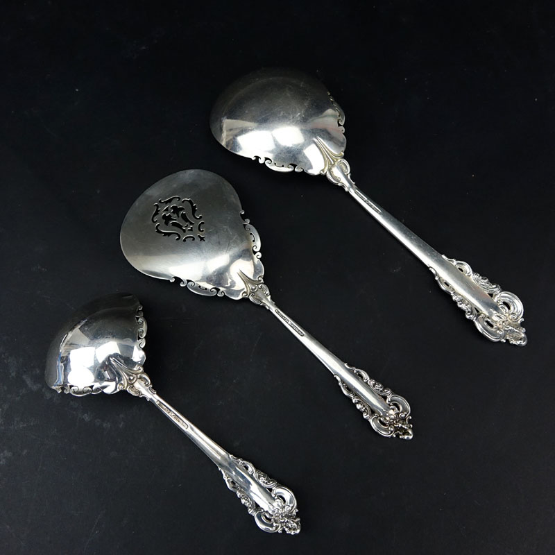 Collection of Three (3) Wallace "Grand Baroque" Sterling Silver Serving Spoons. 