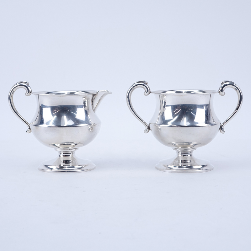 Pair of Sterling Silver Creamer and Sugar with Gold Wash Bowls.