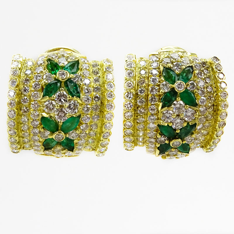 Vintage Tiffany & Co Approx. 3.50 Carat Pave Set Round Brilliant Cut Diamond, 1.50 Carat Marquise Cut Emerald and 18 Karat yellow Gold Ear Clips. 