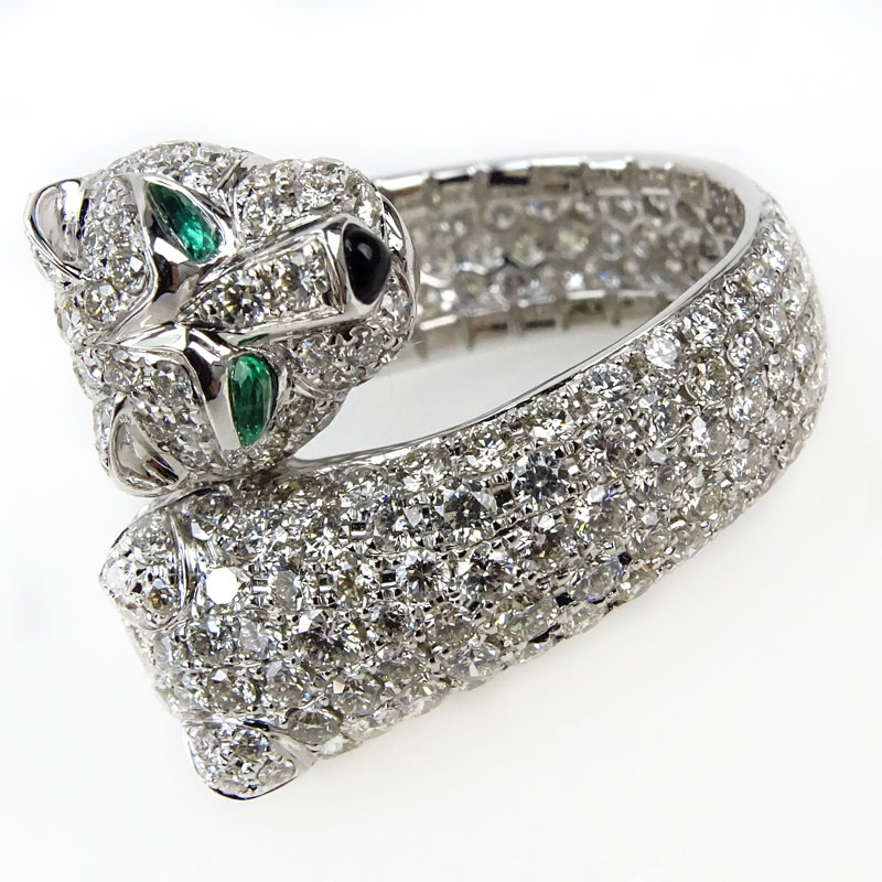 Cartier style Approx. 6.0 Carat Pave Set Round Brilliant Cut Diamond, .20 Carat Emerald and 18 karat White Gold Panther Ring.
