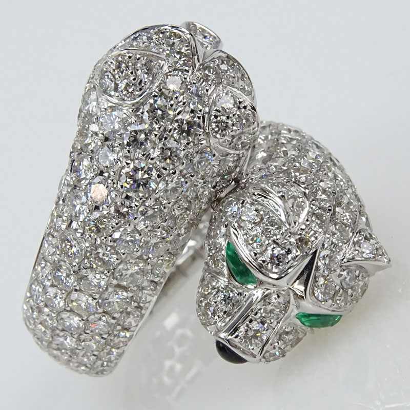 Cartier style Approx. 6.0 Carat Pave Set Round Brilliant Cut Diamond, .20 Carat Emerald and 18 karat White Gold Panther Ring.