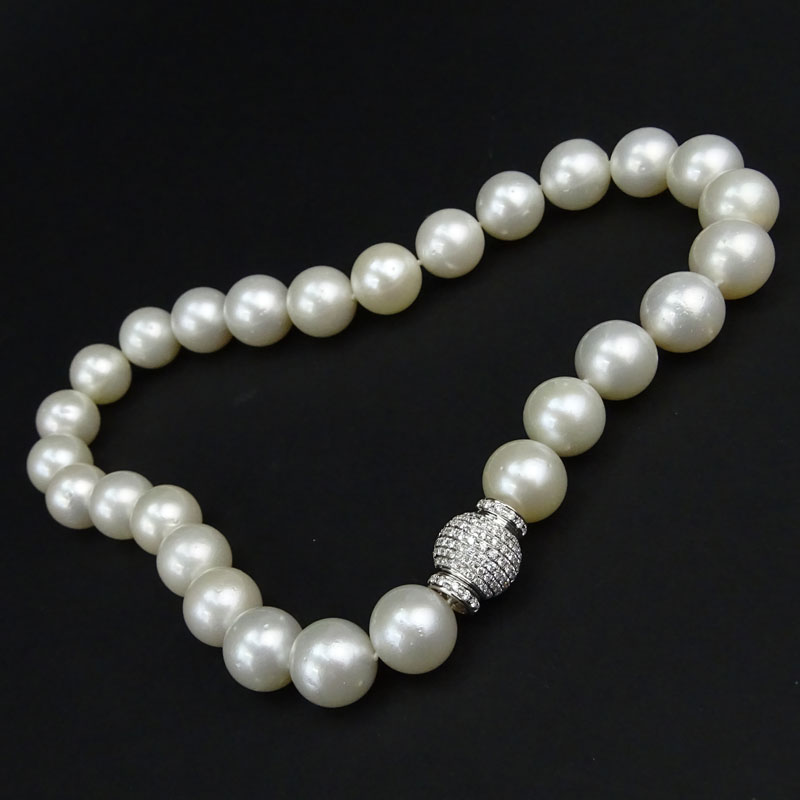Fine Quality 18.0-14.9mm South Sea Pearl Single Strand Necklace with Approx. 3.0 Carat Pave Set Round Brilliant Cut Diamond and 18 Karat White Gold Clasp.