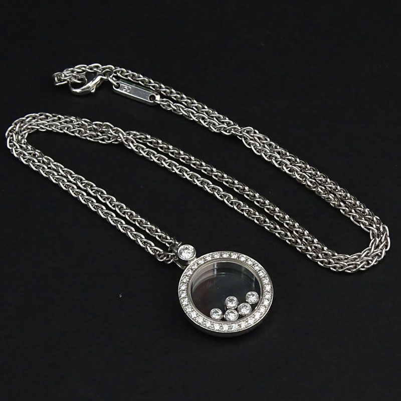 Chopard Diamond and 18 Karat White Gold Happy Diamond Circle Pendant Necklace with Five (5) Floating Diamonds.