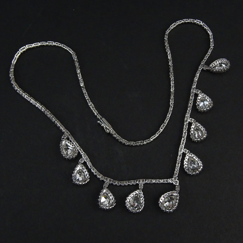 16.0 Carat Diamond and 18 Karat White Gold Necklace set with Nine (9) Pear Shape Diamonds weighing  9.81 Carats and 6.19 Carat Round Brilliant Cut Diamonds.
