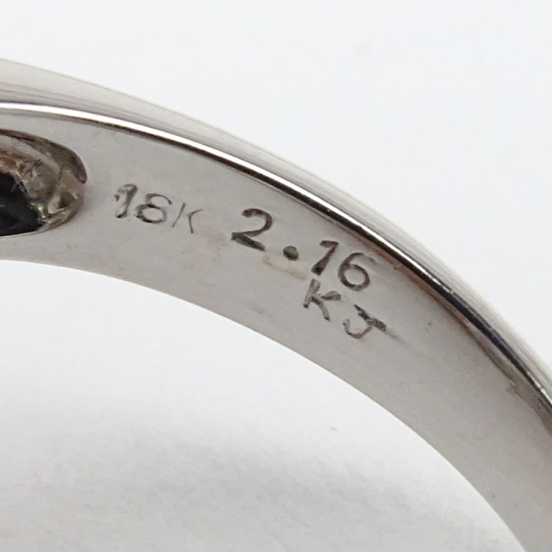 Approx. 2.16 Carat Oval Cut Emerald, 1.76 Carat TW Diamond and 18 Karat White Gold Ring. 