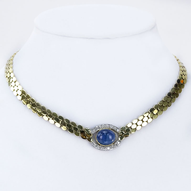 Vintage Approx. 14.25 Carat Cabochon Sapphire, .76 Carat Round Brilliant Cut Diamond and 14 Karat yellow Gold Necklace. 