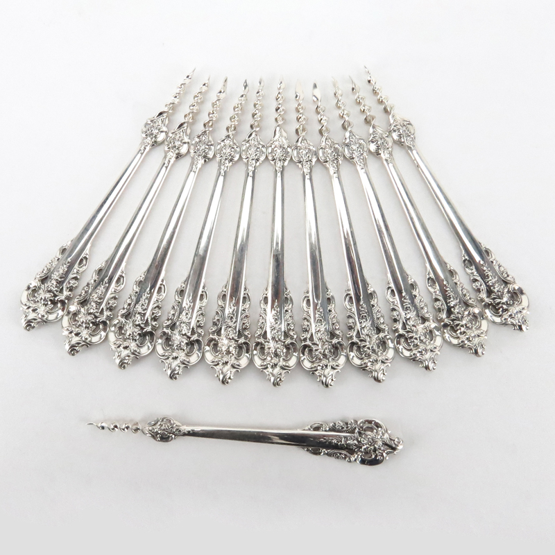 Set of Twelve (12) Wallace "Grand Baroque" Sterling Silver One Tine Butter Picks. 