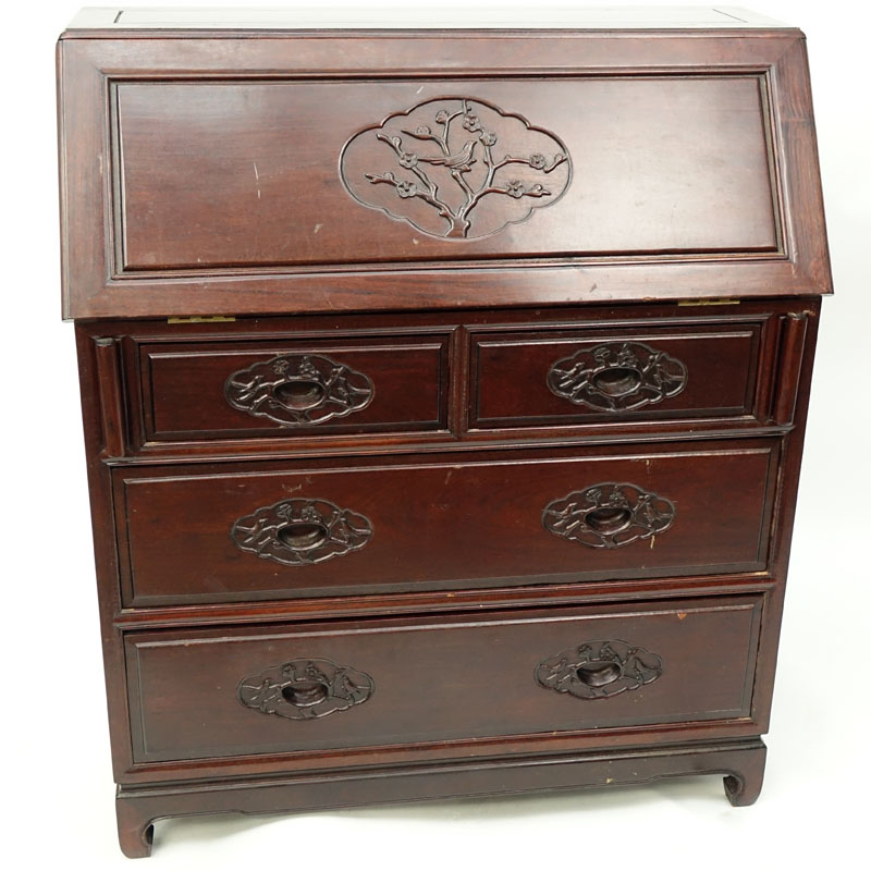 Mid Century Chinese Slant Top Desk. Carved bird relief to front of slant door and 4 drawers, interior storage and compartments.
