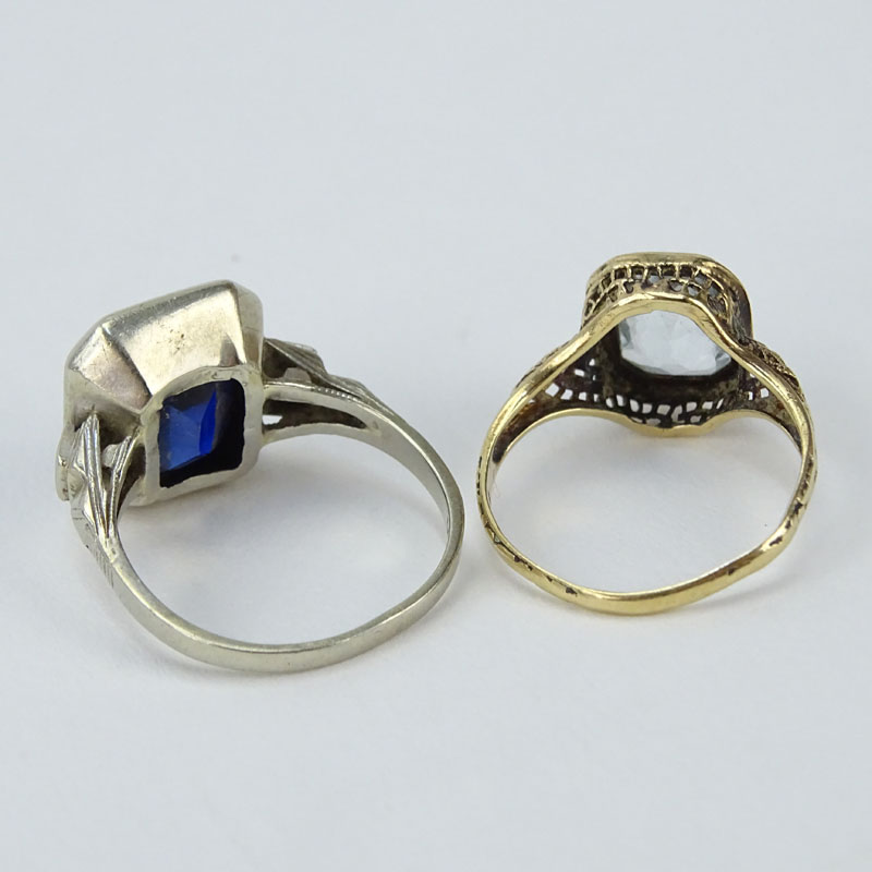Two Antique Rings, one 10 Karat Yellow Gold and Blue Topaz, one 14 Karat White Gold with a  Man Made Sapphire. 