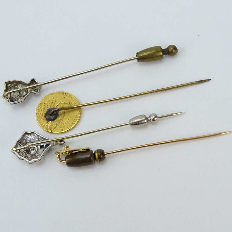 Collection of Four Stick Pins Including: Two (2) Antique Platinum, Diamond and Sapphire Pins.