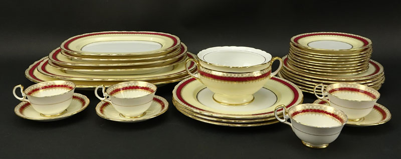 Thirty Two (32) Piece Aynsley Maroon and Gilt Porcelain Scalloped Edge Dinnerware.