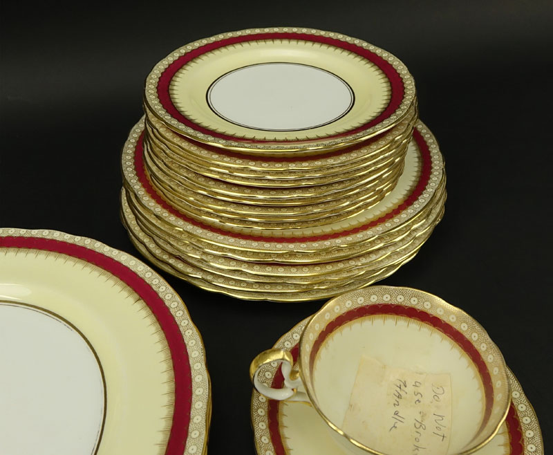 Thirty Two (32) Piece Aynsley Maroon and Gilt Porcelain Scalloped Edge Dinnerware.