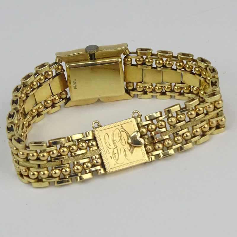 Vintage Vidi 14 Karat Yellow Gold Bracelet Watch with Swiss Manual Movement.