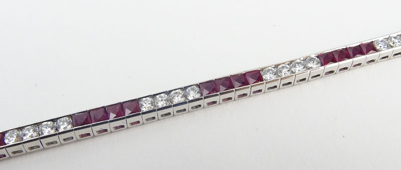 Approx. 3.82 Carat Calibre Cut Ruby, 1.76 Carat Round Brilliant Cut Diamond and Platinum Bracelet. .