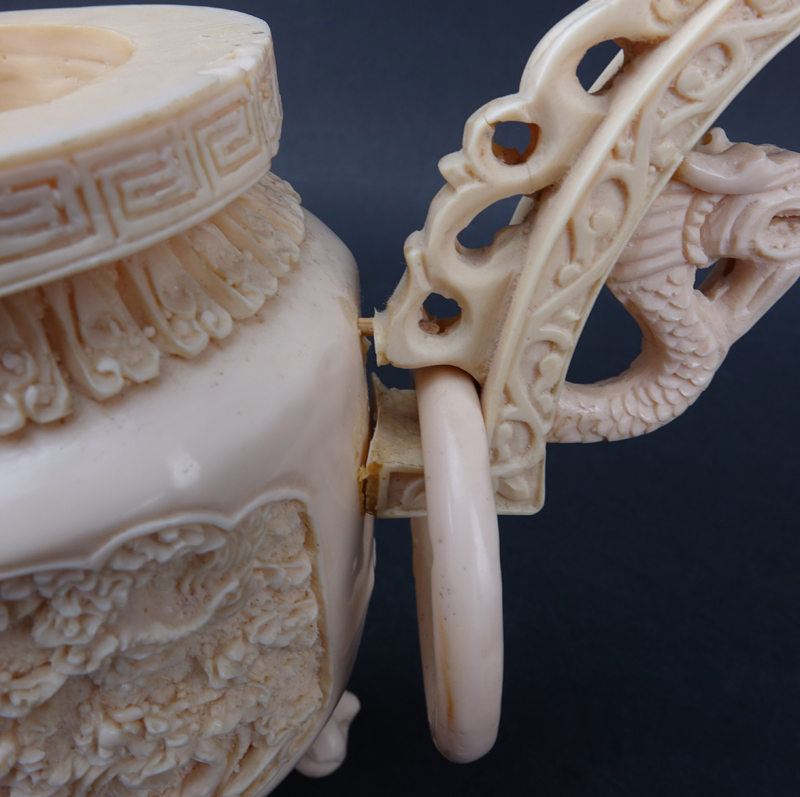 Vintage Faux Ivory Lidded Vessel. Features dragon ring handles, foo dog finial. 