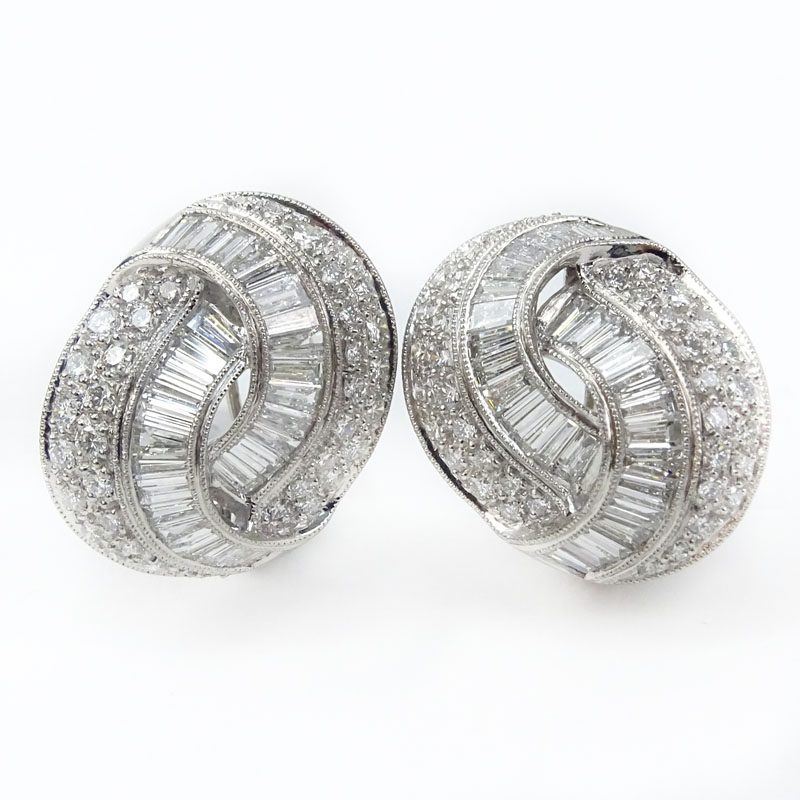 Approx. 5.63 Carat Tapered Baguette and Pave Set Round Brilliant Cut Diamond and Platinum Earrings. .