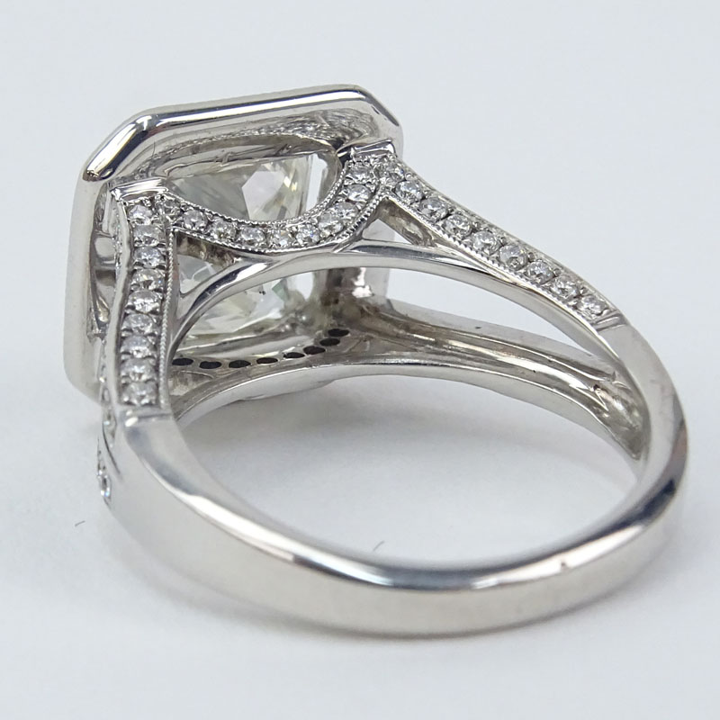 Approx. 3.00 Carat Princess Cut Diamond and 18 Karat White Gold Engagement Ring accented with 1.0 Carat Pave Set Round Brilliant Cut Diamonds. .